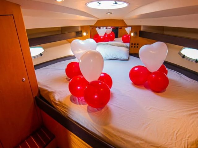 Bedroom with balloon decoration at our luxury yacht in Dubai