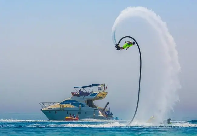 fly board ride with luxury yachts in Marina